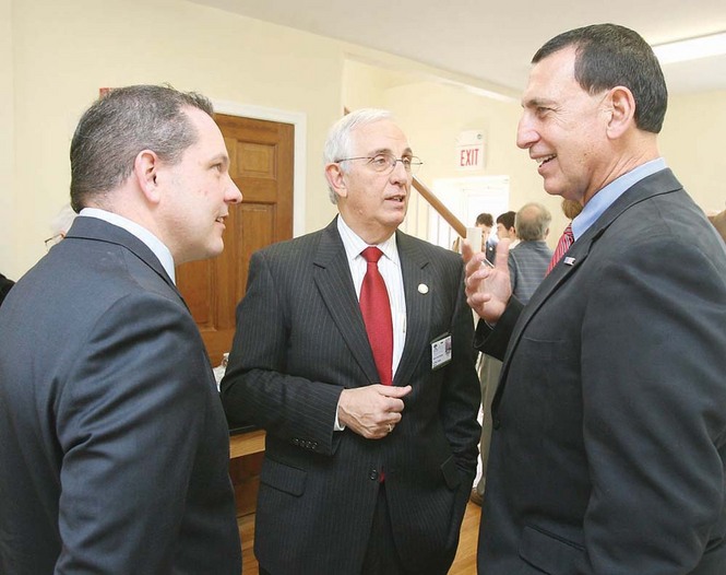 President of Energy Freedom Pioneers Brian Blair, left, and President of Salem Community College Dr. Pete Contini, center, talk with U.S. Rep Frank LoBiondo Friday morning during the Sustainable Energy Center Dedication in Oldmans Township
